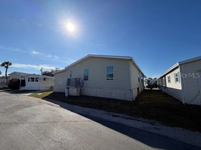 a house view with a backyard space