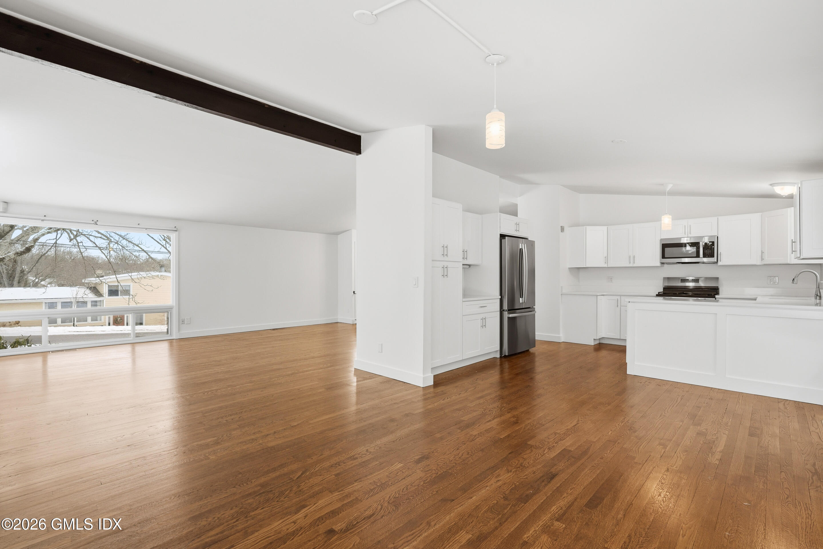 4 Split Timber Place Riverside, CT 06878 - Photo 1 of 38 a view of a kitchen with a sink and refrigerator