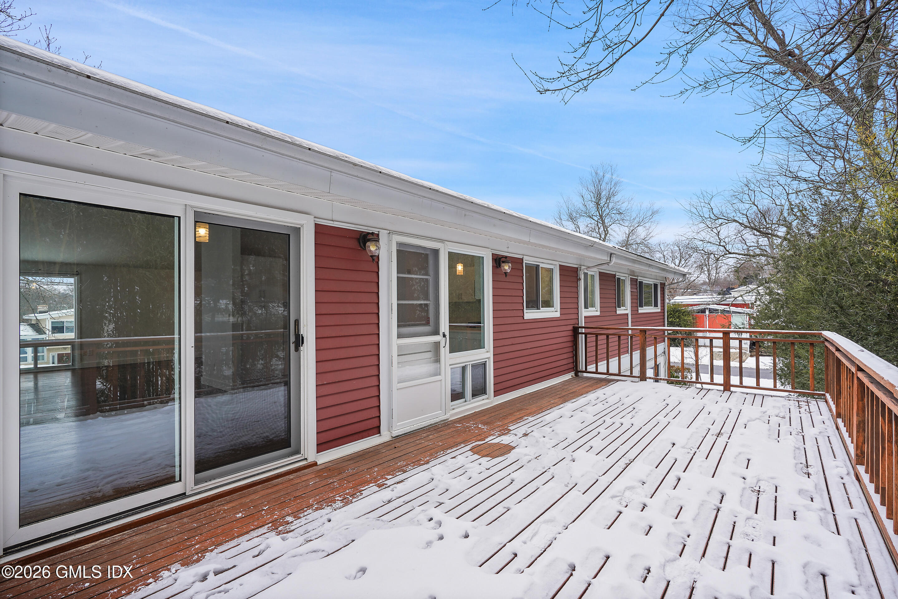 4 Split Timber Place Riverside, CT 06878 - Photo 13 of 38 a view of backyard with a deck and wooden floor