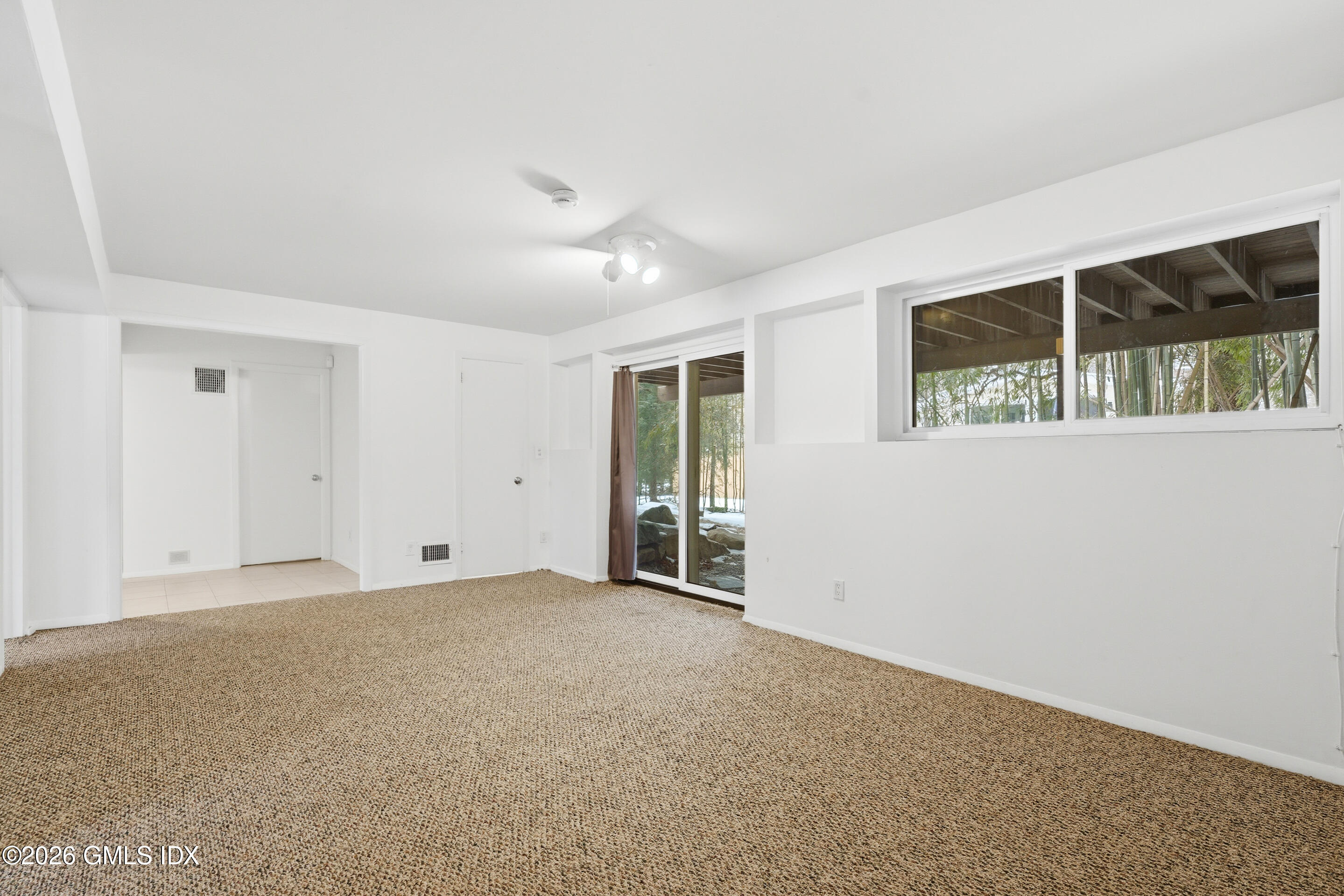 4 Split Timber Place Riverside, CT 06878 - Photo 17 of 38 a view of an empty room with a window