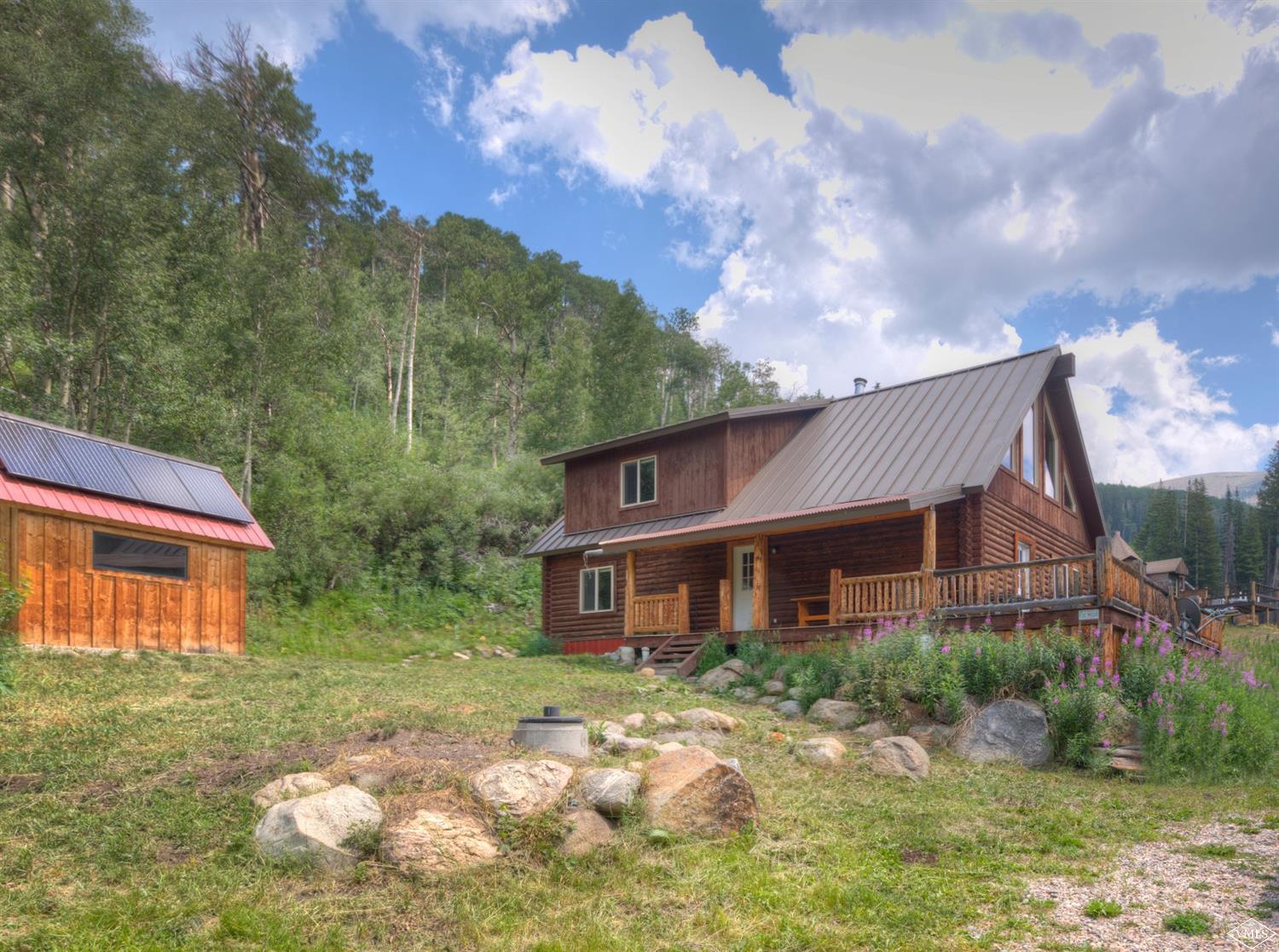 320 Mill Road Eagle, CO 81631 - Photo 20 of 24 a front view of a house with garden