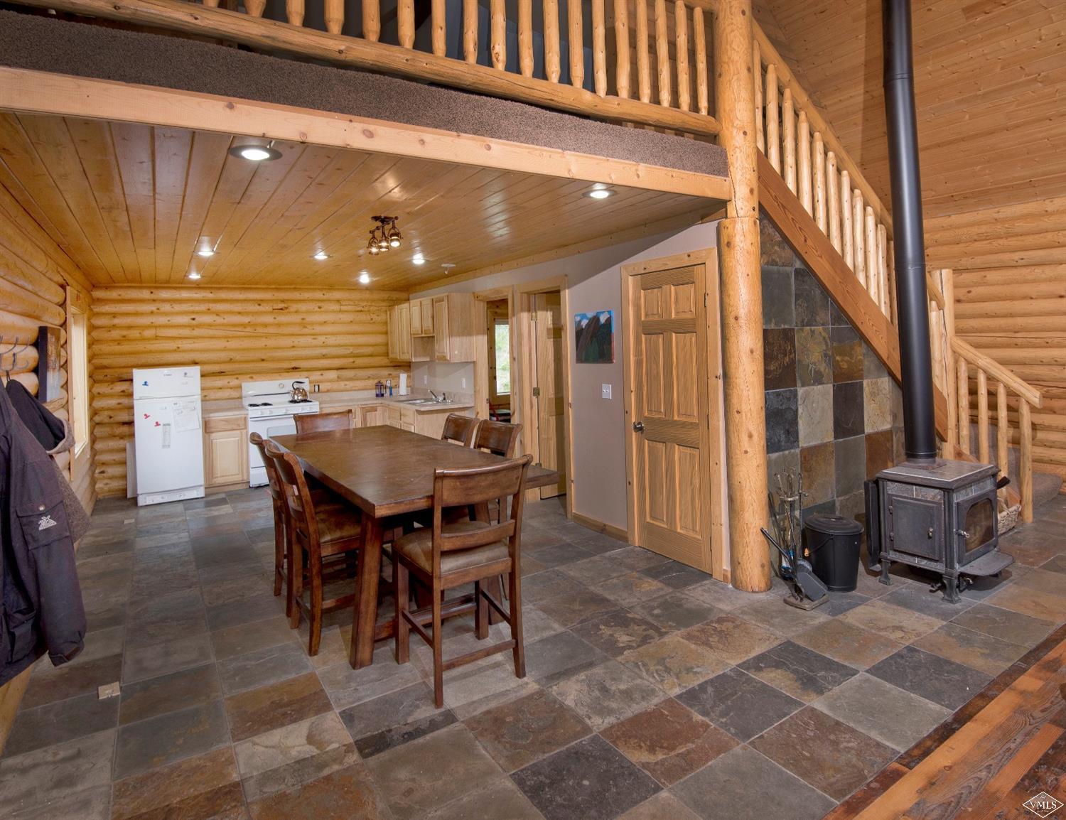320 Mill Road Eagle, CO 81631 - Photo 3 of 24 a view of a dinning table and chairs in the patio