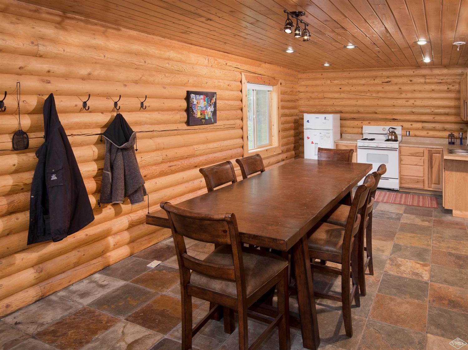 320 Mill Road Eagle, CO 81631 - Photo 7 of 24 a dining room with furniture and wooden floor