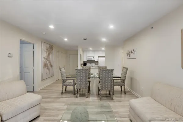 a view of a dining room with furniture