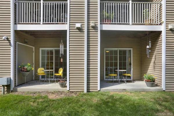a view of an house with backyard space and garden