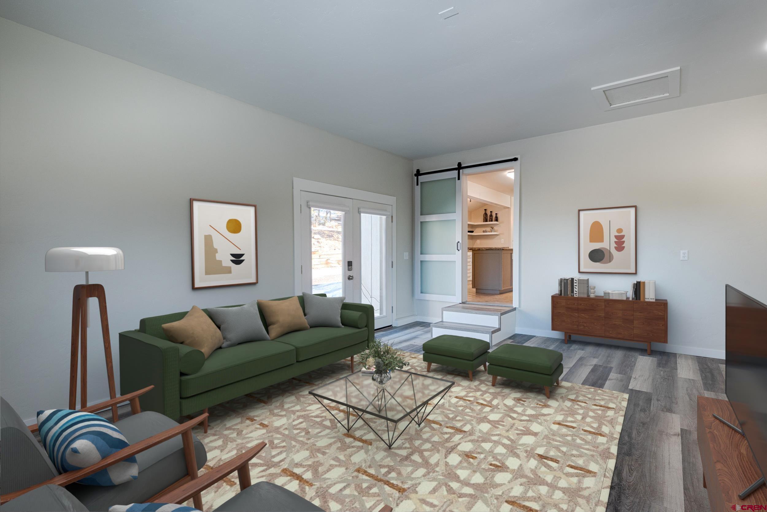 711 Terrace Drive Ridgway, CO 81432 - Photo 11 of 32 a living room with furniture rug and window