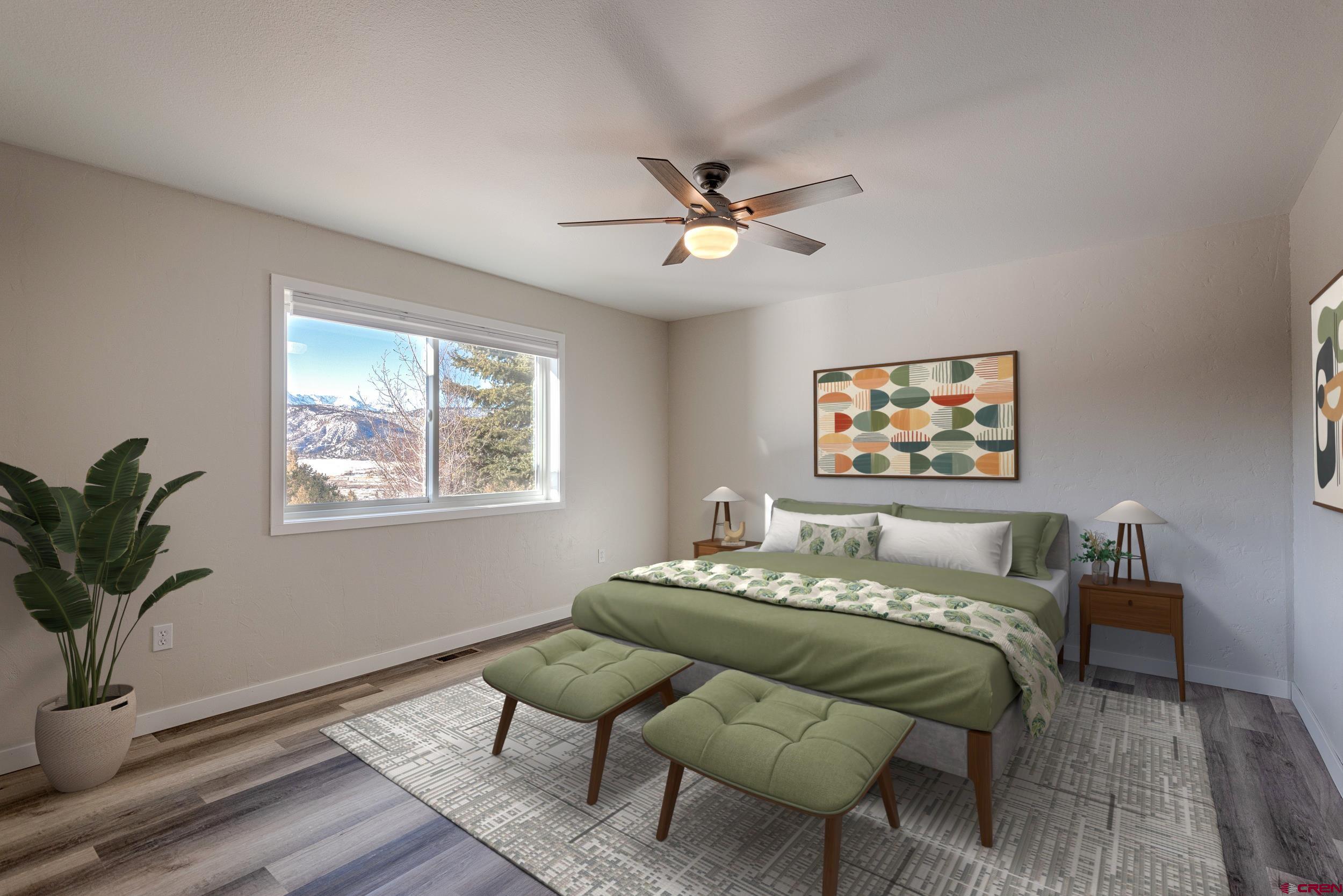 711 Terrace Drive Ridgway, CO 81432 - Photo 12 of 32 a living room with furniture and a potted plant