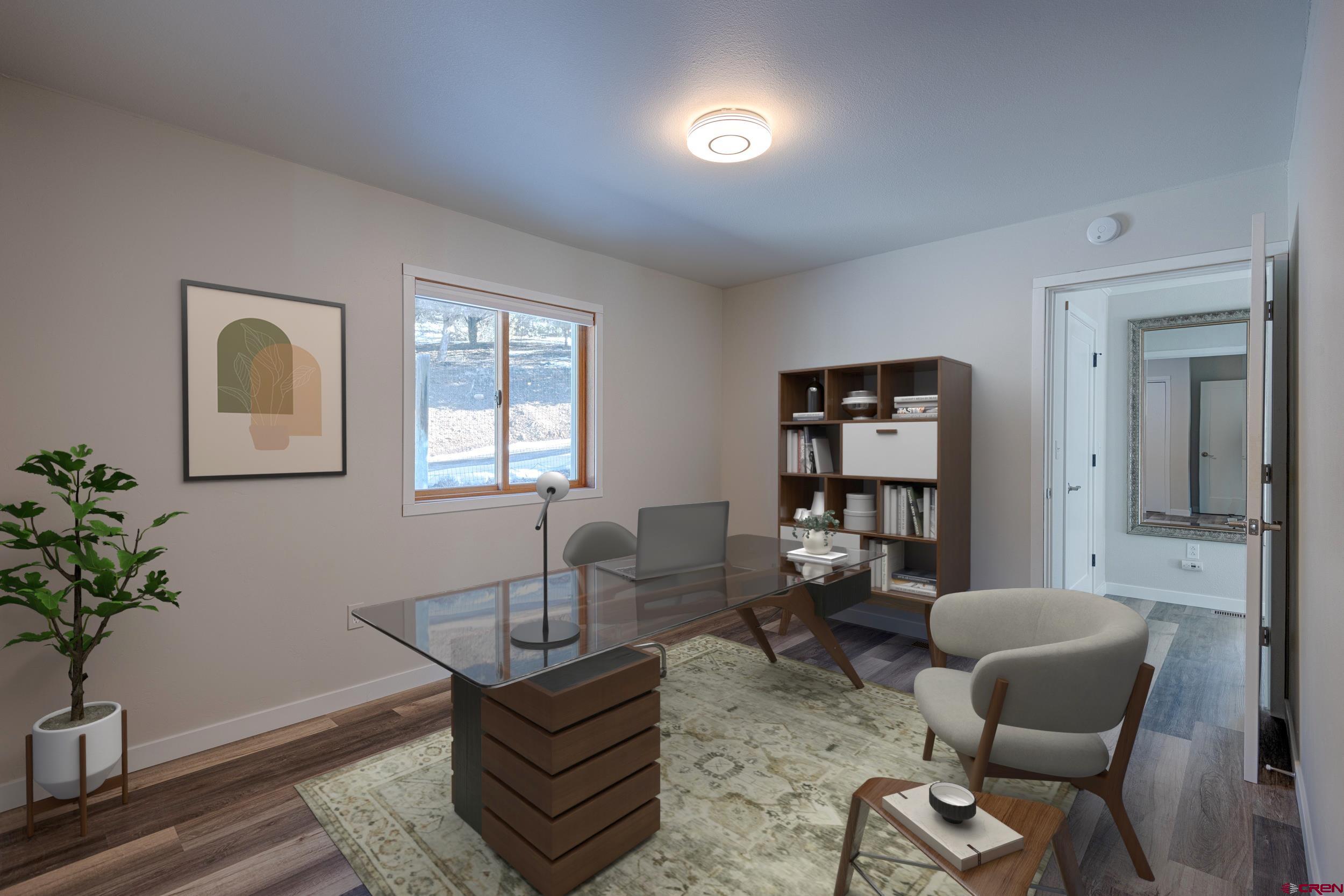 711 Terrace Drive Ridgway, CO 81432 - Photo 15 of 32 a living room with furniture and wooden floor