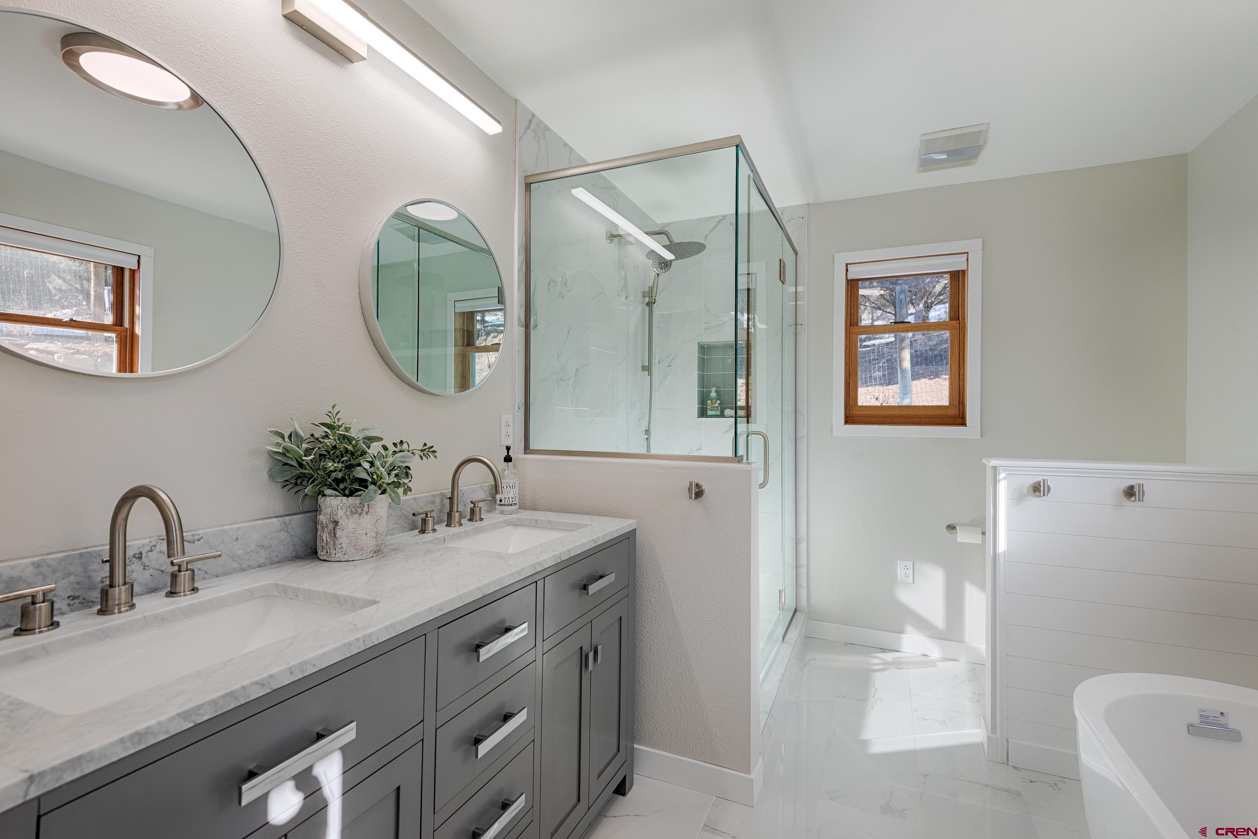 711 Terrace Drive Ridgway, CO 81432 - Photo 17 of 32 a bathroom with a sink and a mirror