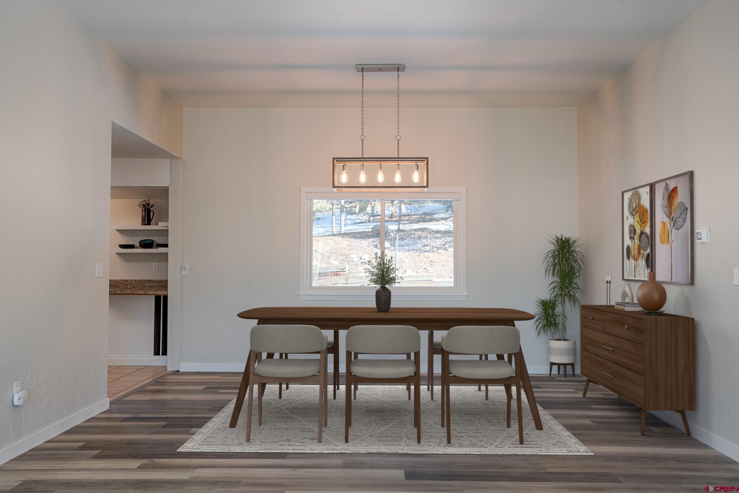 711 Terrace Drive Ridgway, CO 81432 - Photo 4 of 32 a dining room with furniture and window