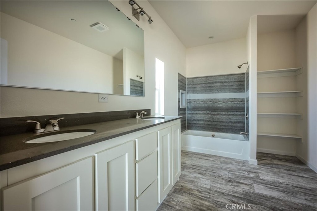 12076 Lager Road Phelan, CA 92371 - Photo 15 of 30 a bathroom with a sink and a mirror