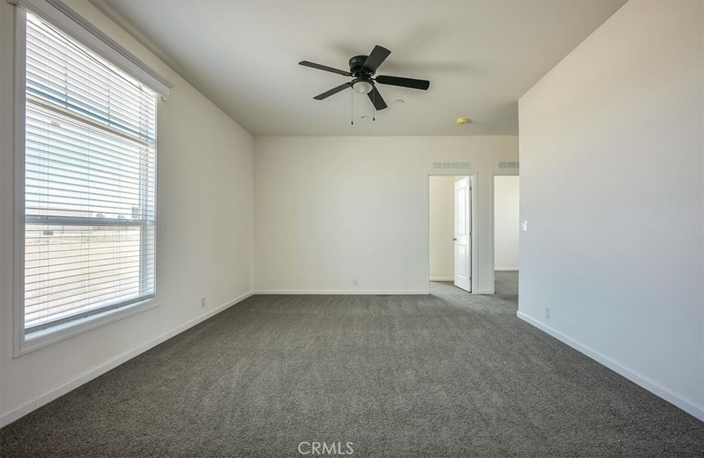 12076 Lager Road Phelan, CA 92371 - Photo 17 of 30 a view of an empty room with a window