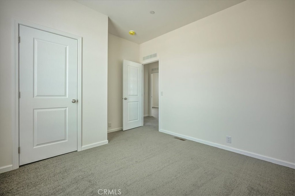 12076 Lager Road Phelan, CA 92371 - Photo 25 of 30 an empty room with closet area