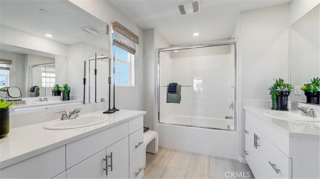 1210 Yeager Avenue Rialto, CA 92376 - Photo 14 of 24 a bathroom with a sink a toilet and shower