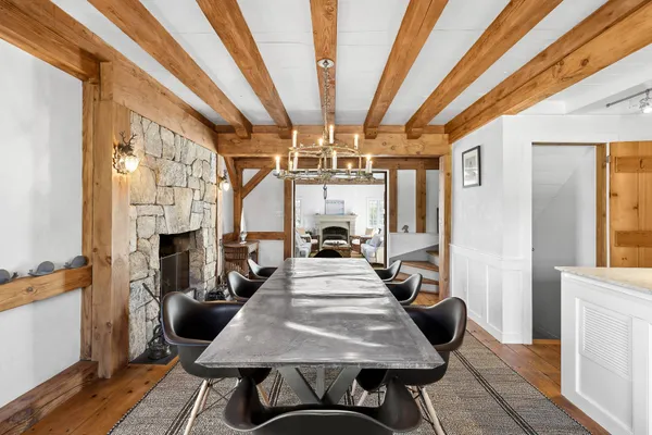 a view of a patio with table and chairs