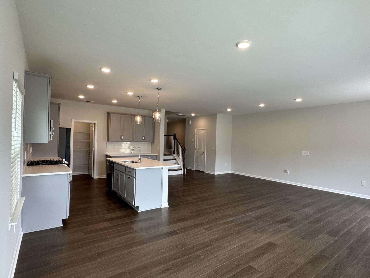 3114 Ranger Drive Durham, NC 27703 - Photo 12 of 33 a kitchen with a sink and a refrigerator