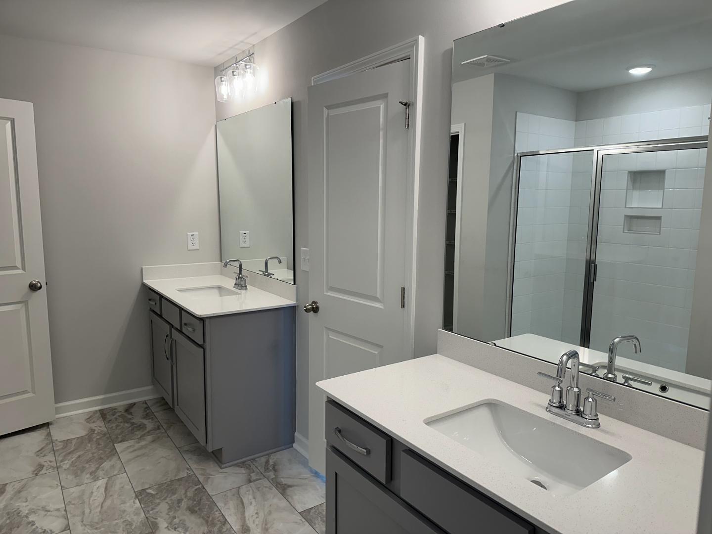 3114 Ranger Drive Durham, NC 27703 - Photo 19 of 33 a bathroom with a sink and a mirror