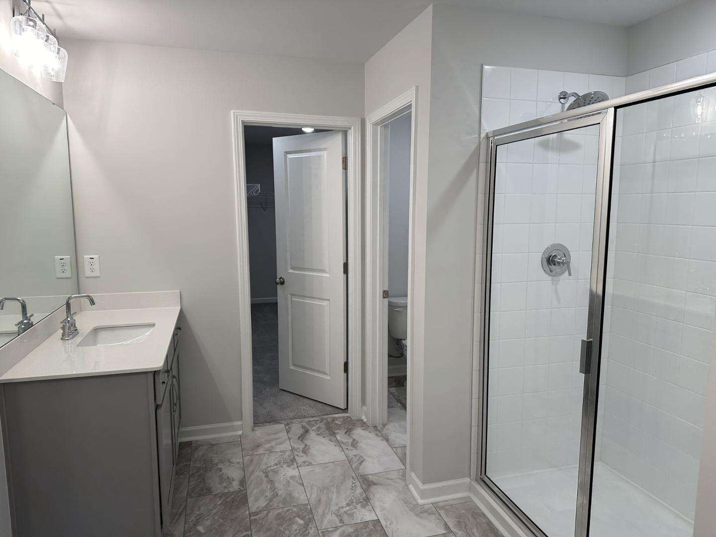3114 Ranger Drive Durham, NC 27703 - Photo 20 of 33 a bathroom with a sink and a mirror