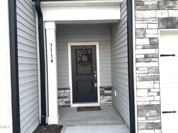 a view of a door and a window