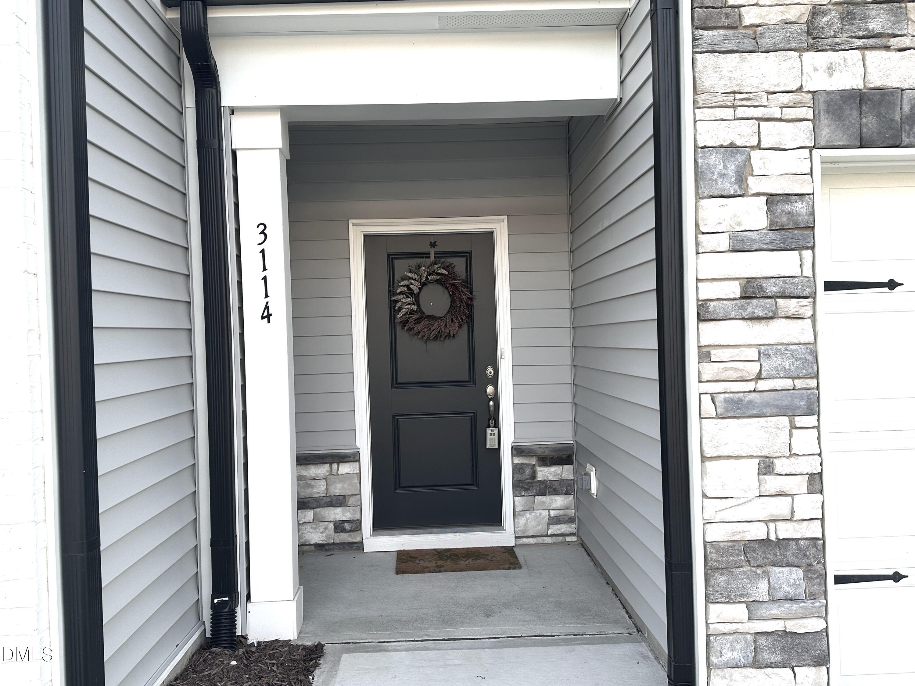 3114 Ranger Drive Durham, NC 27703 - Photo 4 of 33 a view of a door and a window