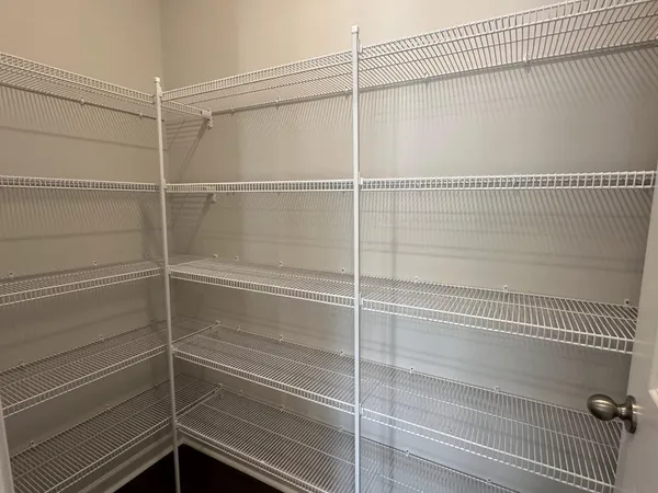 a view of a room with racks on the wall