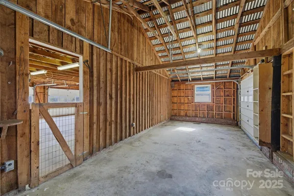 a view of an empty room with stairs