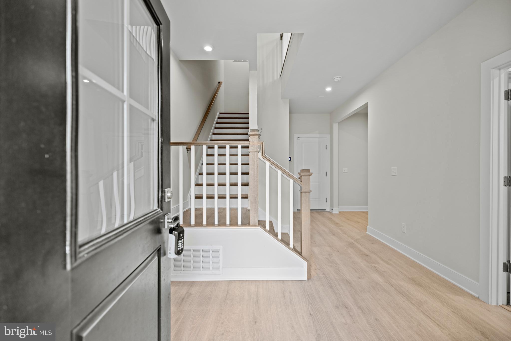 1548 Meadowlark Glen Road Dumfries, VA 22026 - Photo 2 of 48 a view of entryway with wooden floor
