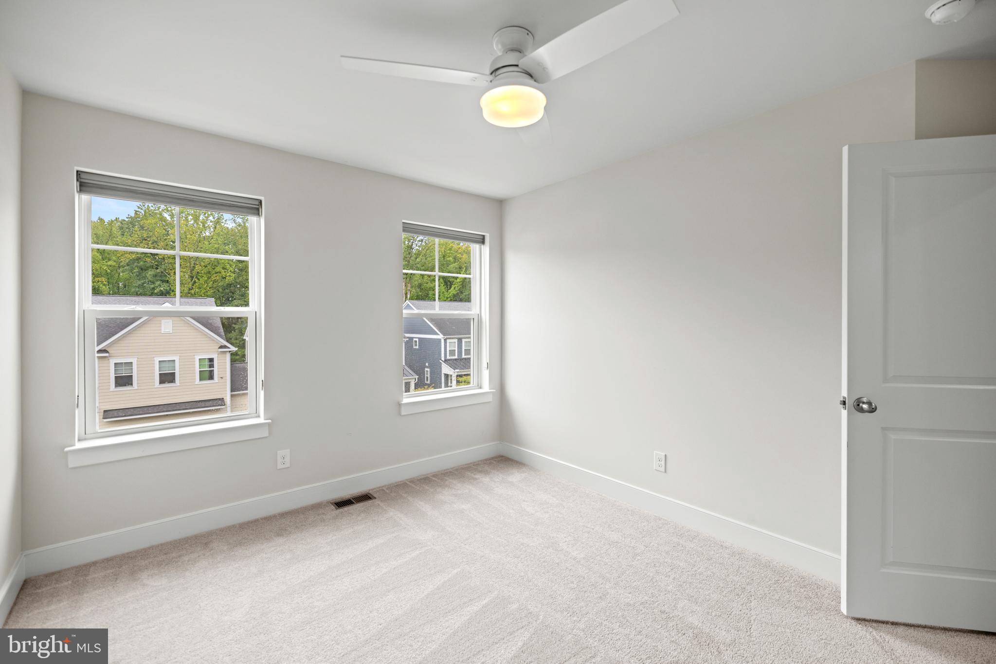 1548 Meadowlark Glen Road Dumfries, VA 22026 - Photo 38 of 48 a view of an empty room with a window