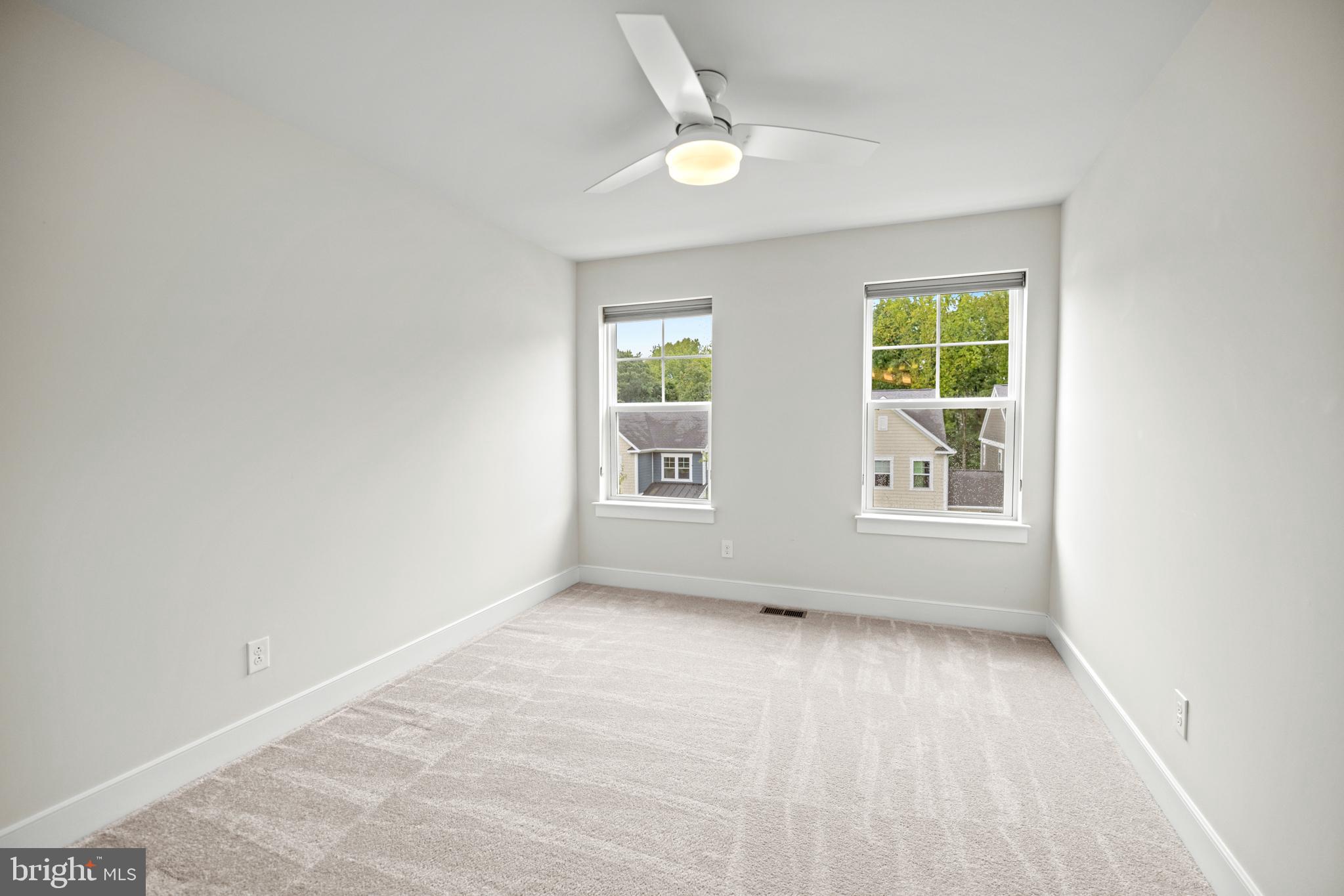 1548 Meadowlark Glen Road Dumfries, VA 22026 - Photo 39 of 48 an empty room with a window and a ceiling fan
