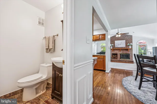 a bedroom with a bed dresser and a window