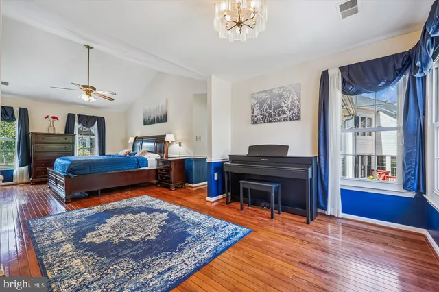 a bed room with furniture and a table