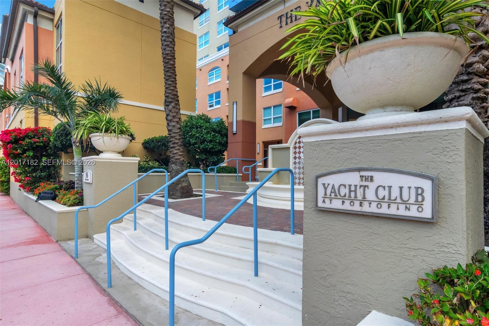 90 Alton Road, Unit 2303 Miami Beach, FL 33139 - Photo 2 of 29 a view of an outdoor space with a table and chairs