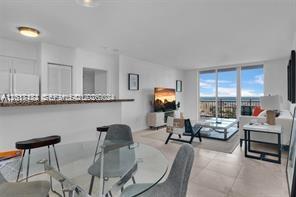 90 Alton Road, Unit 2303 Miami Beach, FL 33139 - Photo 21 of 29 a living room with furniture