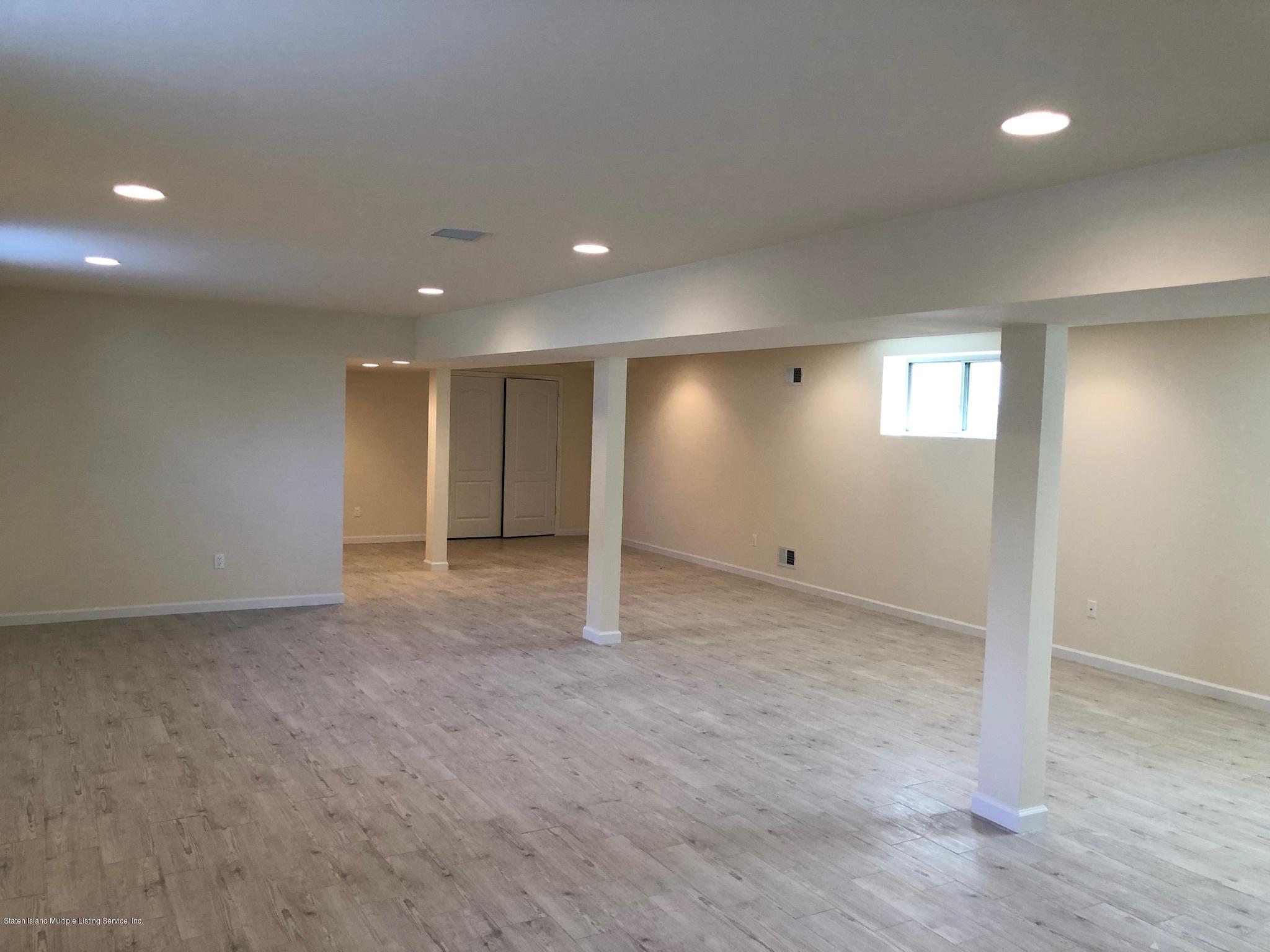 600 Foster Road Staten Island, NY 10309 - Photo 11 of 12 Full Finished Basement w/tiled floors