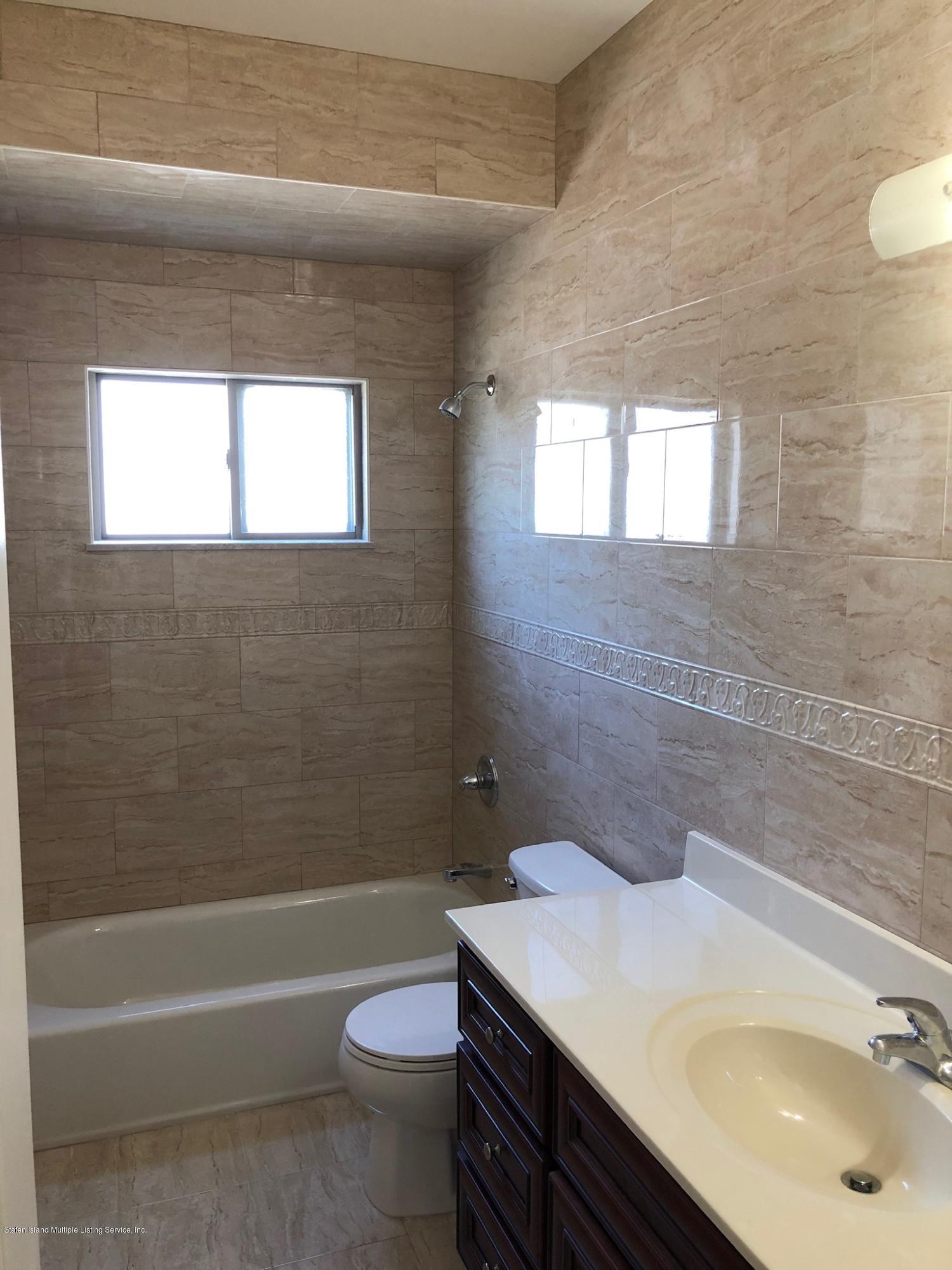 600 Foster Road Staten Island, NY 10309 - Photo 6 of 12 3/4 Bath tiled to the ceiling