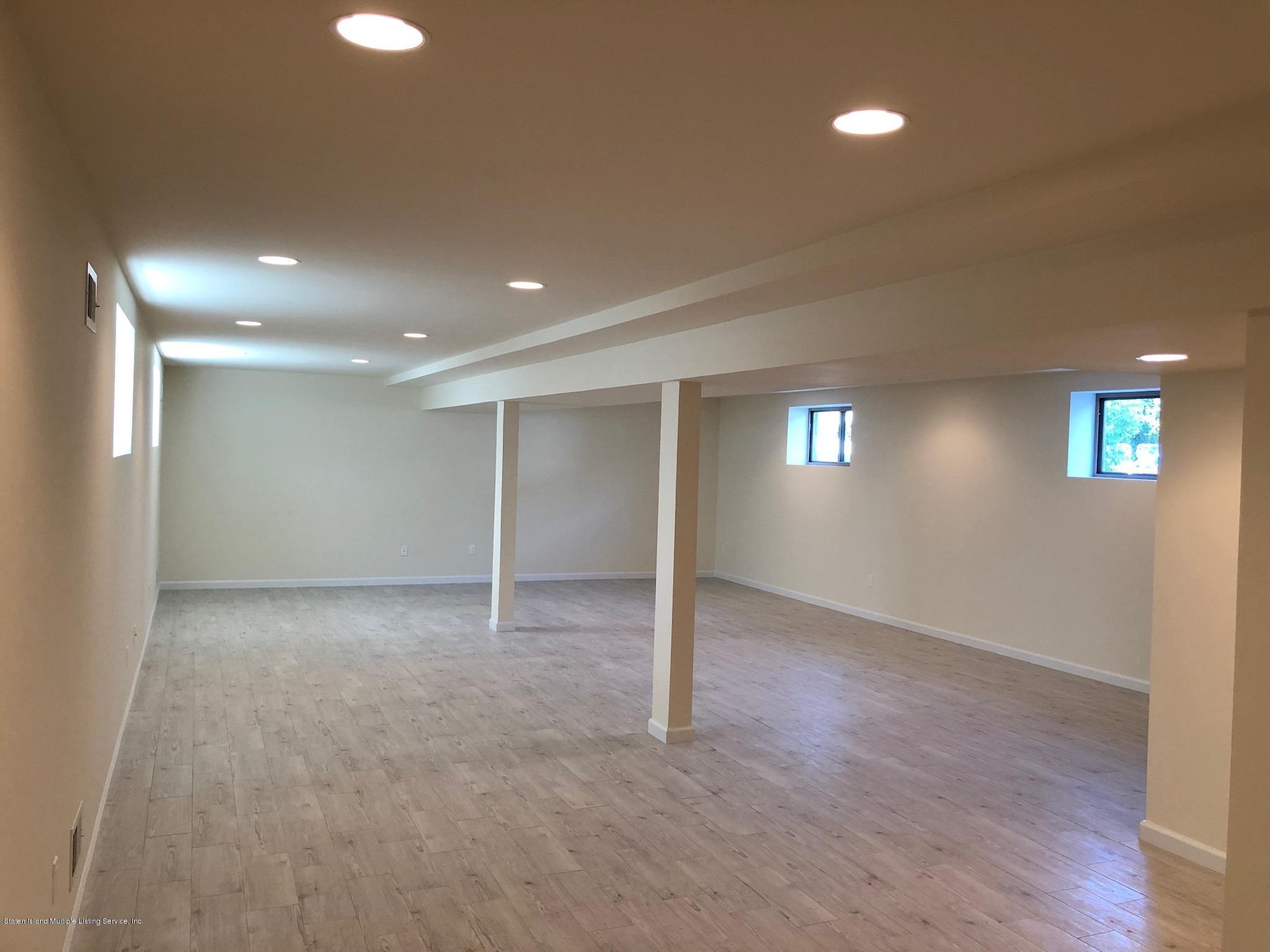 600 Foster Road Staten Island, NY 10309 - Photo 10 of 12 Full Finished Basement w/tiled floors