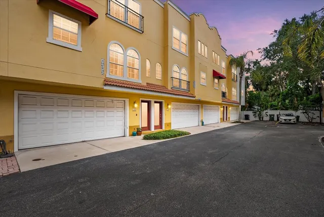 a view of a building with a street