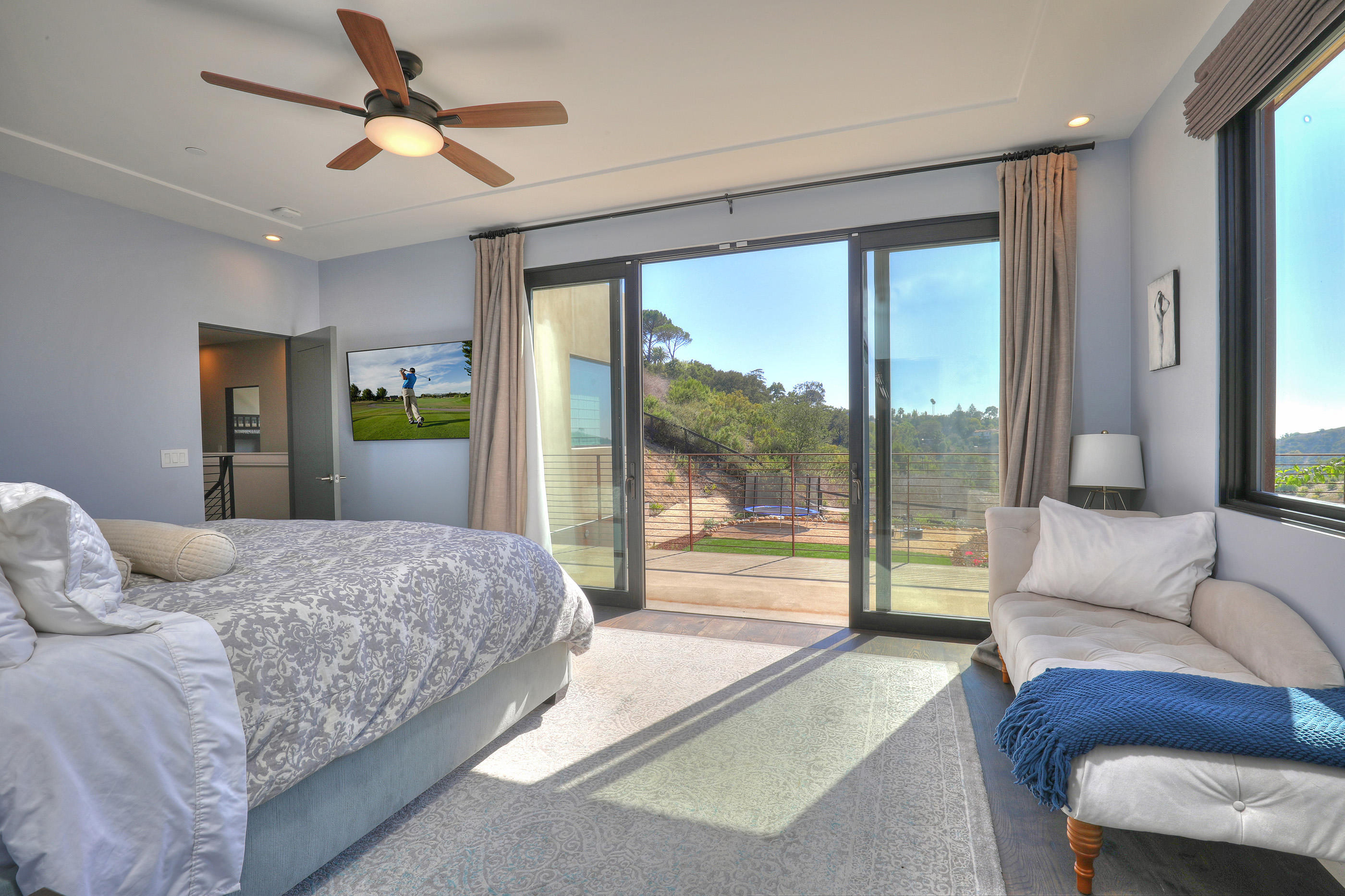 1100 Palomino Road Santa Barbara, CA 93105 - Photo 16 of 34 a bedroom with a large bed and a large window