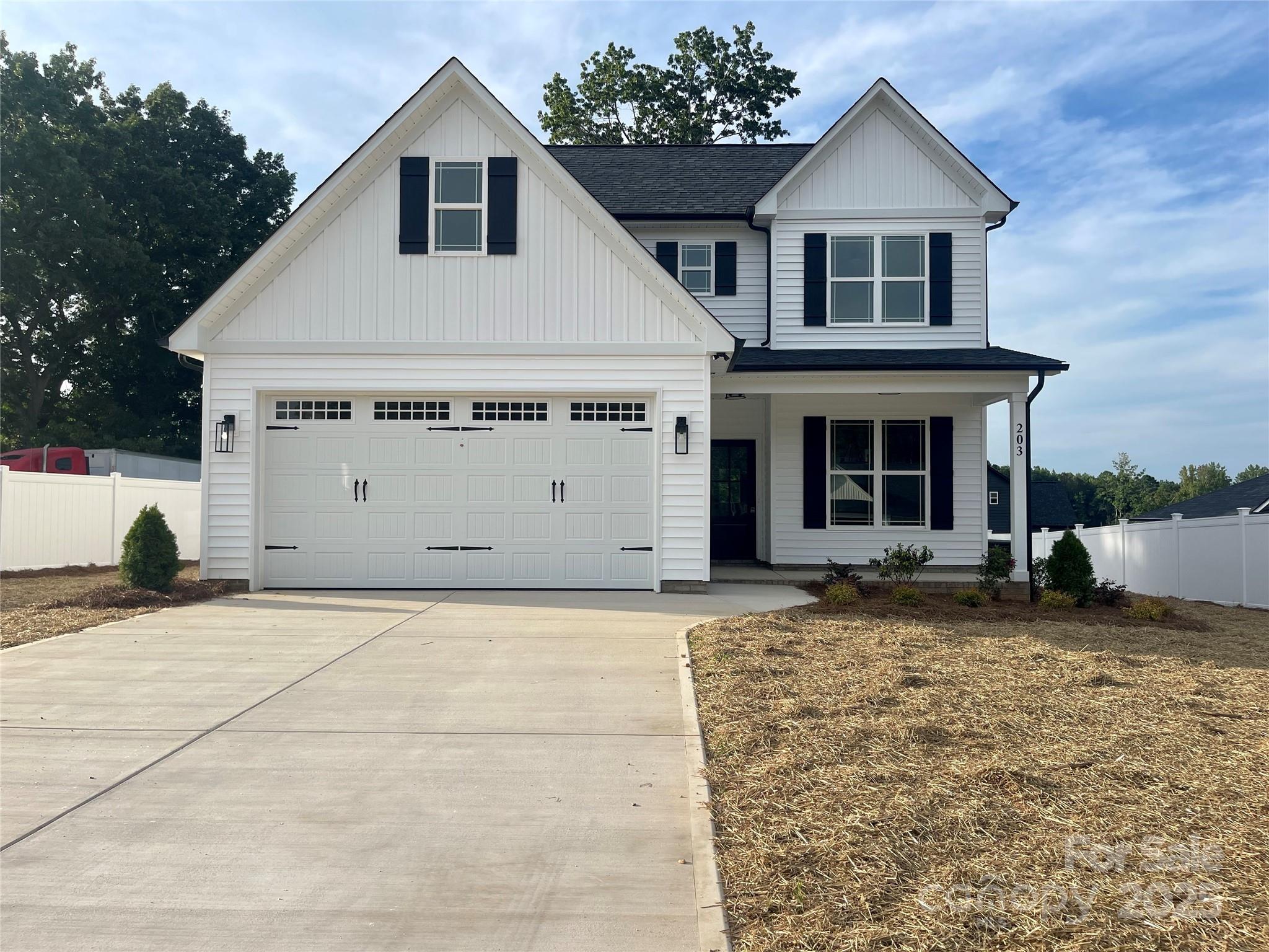 203 Prospect Church Road Albemarle, NC 28001 - Photo 1 of 44 a view of a house with a yard