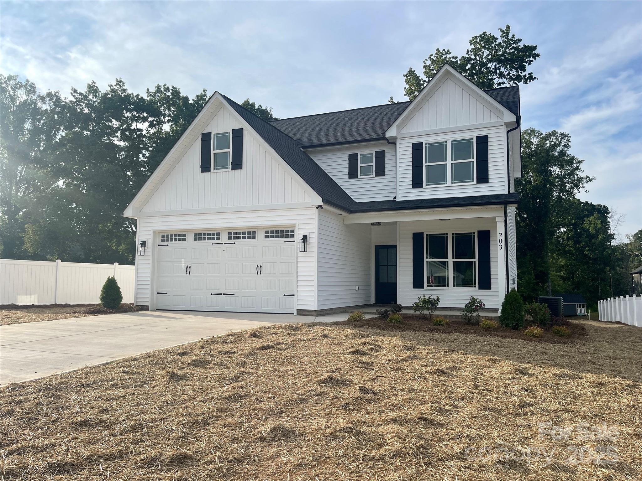 203 Prospect Church Road Albemarle, NC 28001 - Photo 2 of 44 a view of a house with a yard