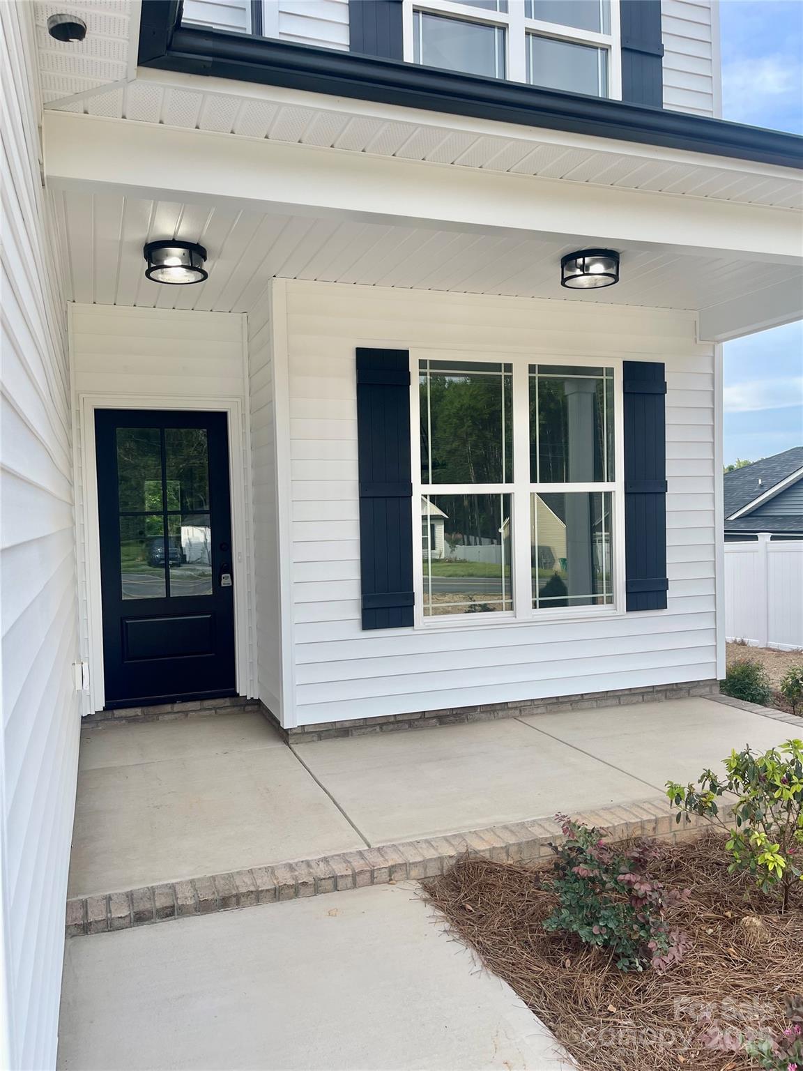203 Prospect Church Road Albemarle, NC 28001 - Photo 3 of 44 a view of front door of house