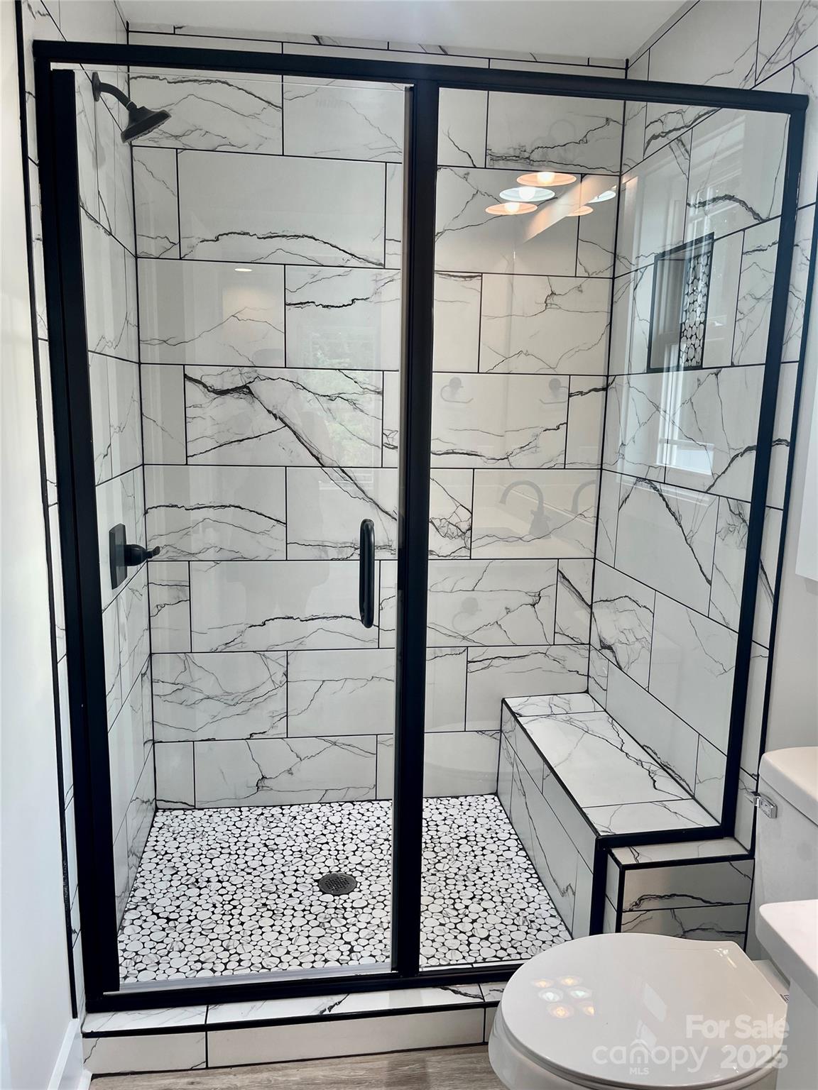 203 Prospect Church Road Albemarle, NC 28001 - Photo 36 of 44 a bathroom with a shower and toilet