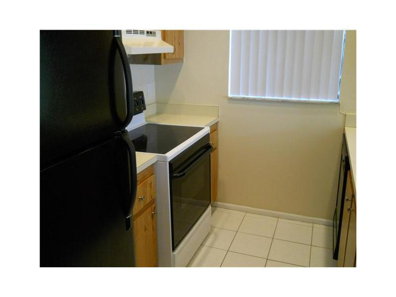 10057 Winding Lake Road, Unit 102 Sunrise, FL 33351 - Photo 2 of 4 Kitchen