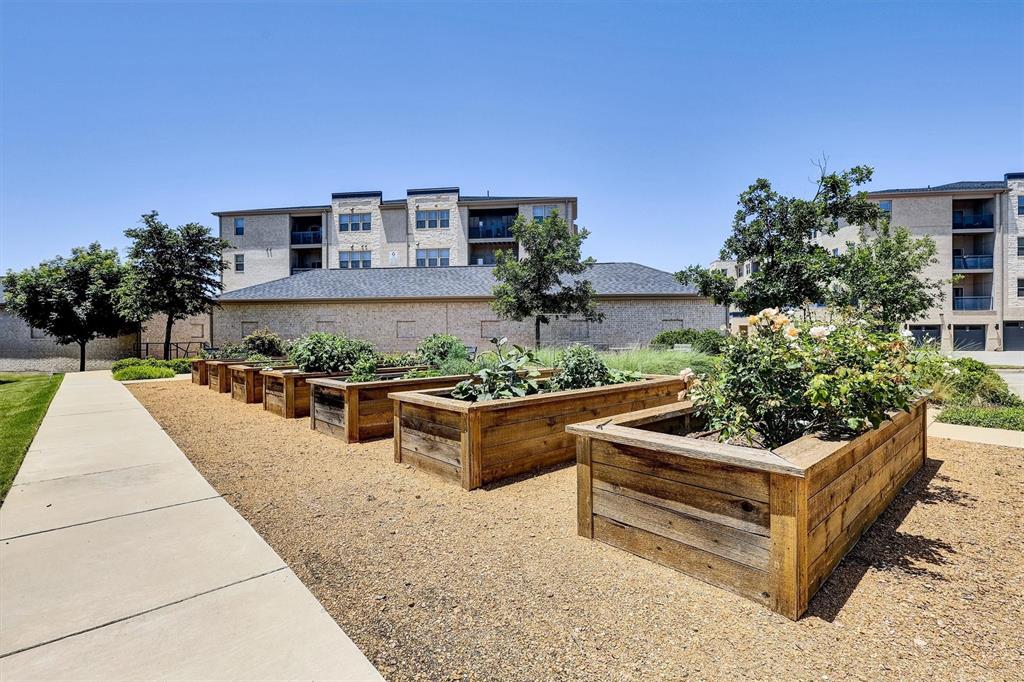 651 Watters Road, Unit 2105 Allen, TX 75013 - Photo 26 of 32 a view of a patio with couches and potted plants