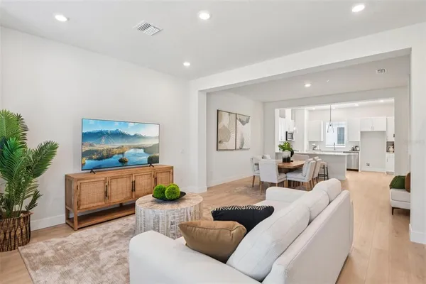 a living room with furniture and a couch