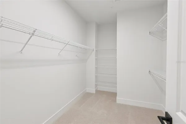 a bathroom with a sink a shower and a mirror