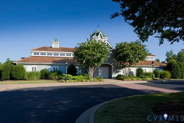 a view of a swimming pool with a yard