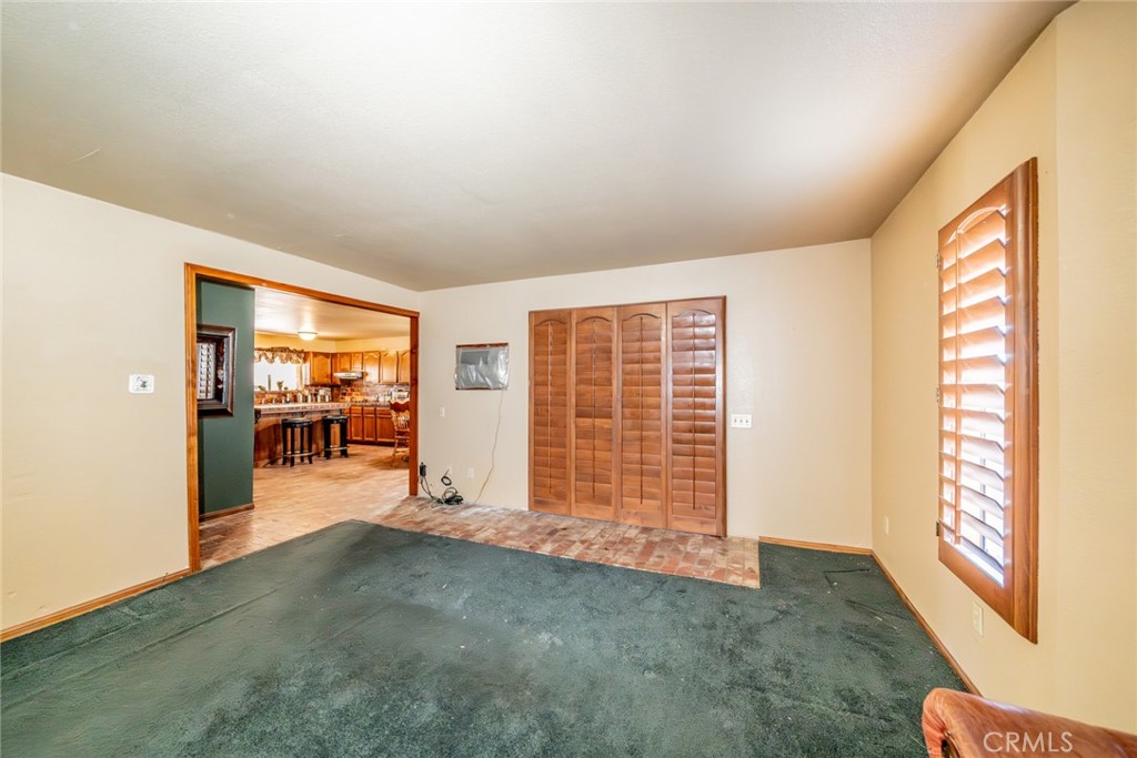 3230 Silver Ridge Drive Pinon Hills, CA 92372 - Photo 27 of 49 an empty room with windows