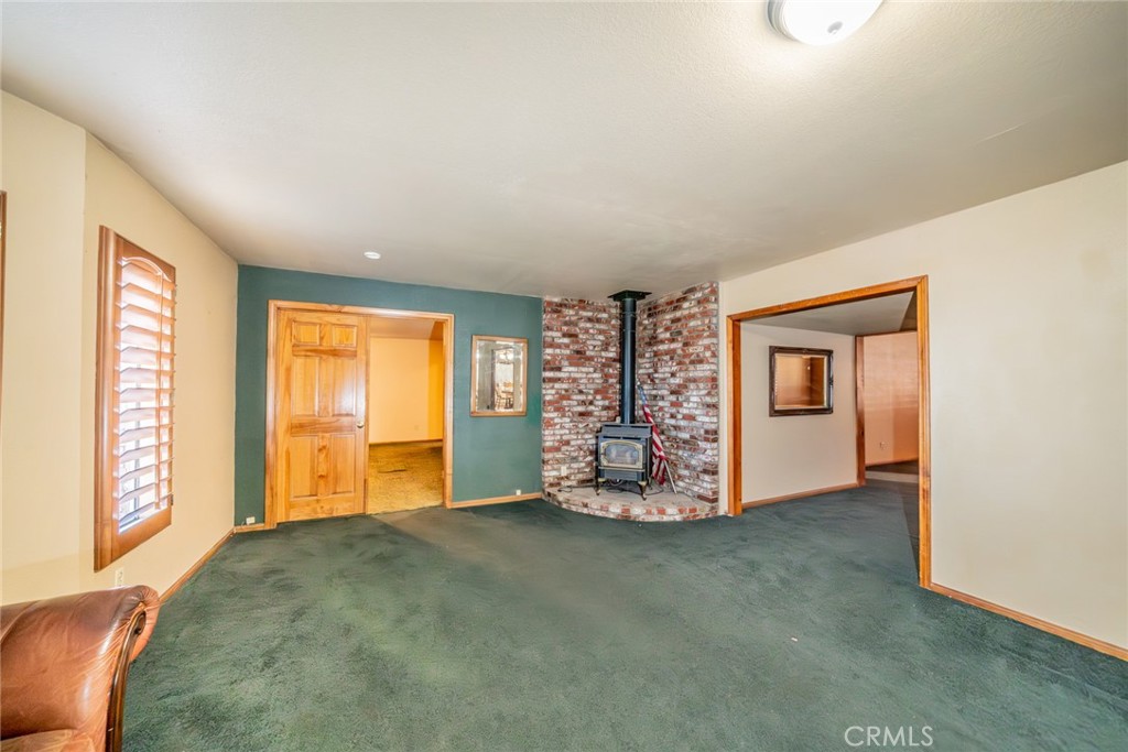 3230 Silver Ridge Drive Pinon Hills, CA 92372 - Photo 29 of 49 a view of an empty room with a window