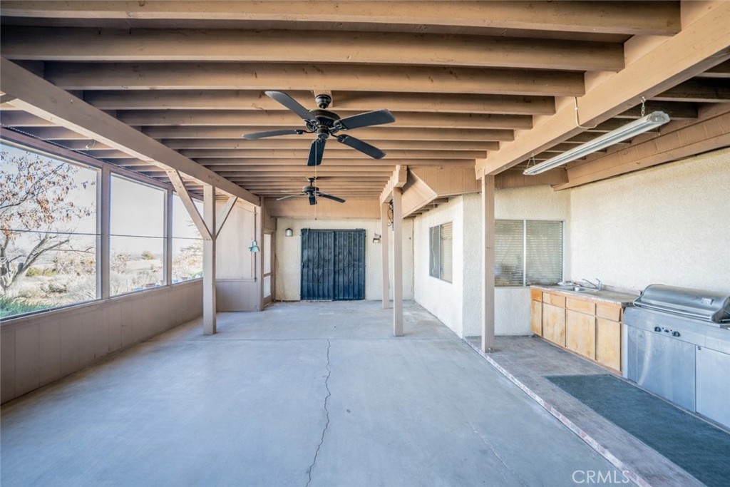 3230 Silver Ridge Drive Pinon Hills, CA 92372 - Photo 8 of 49 a view of an empty room with a window